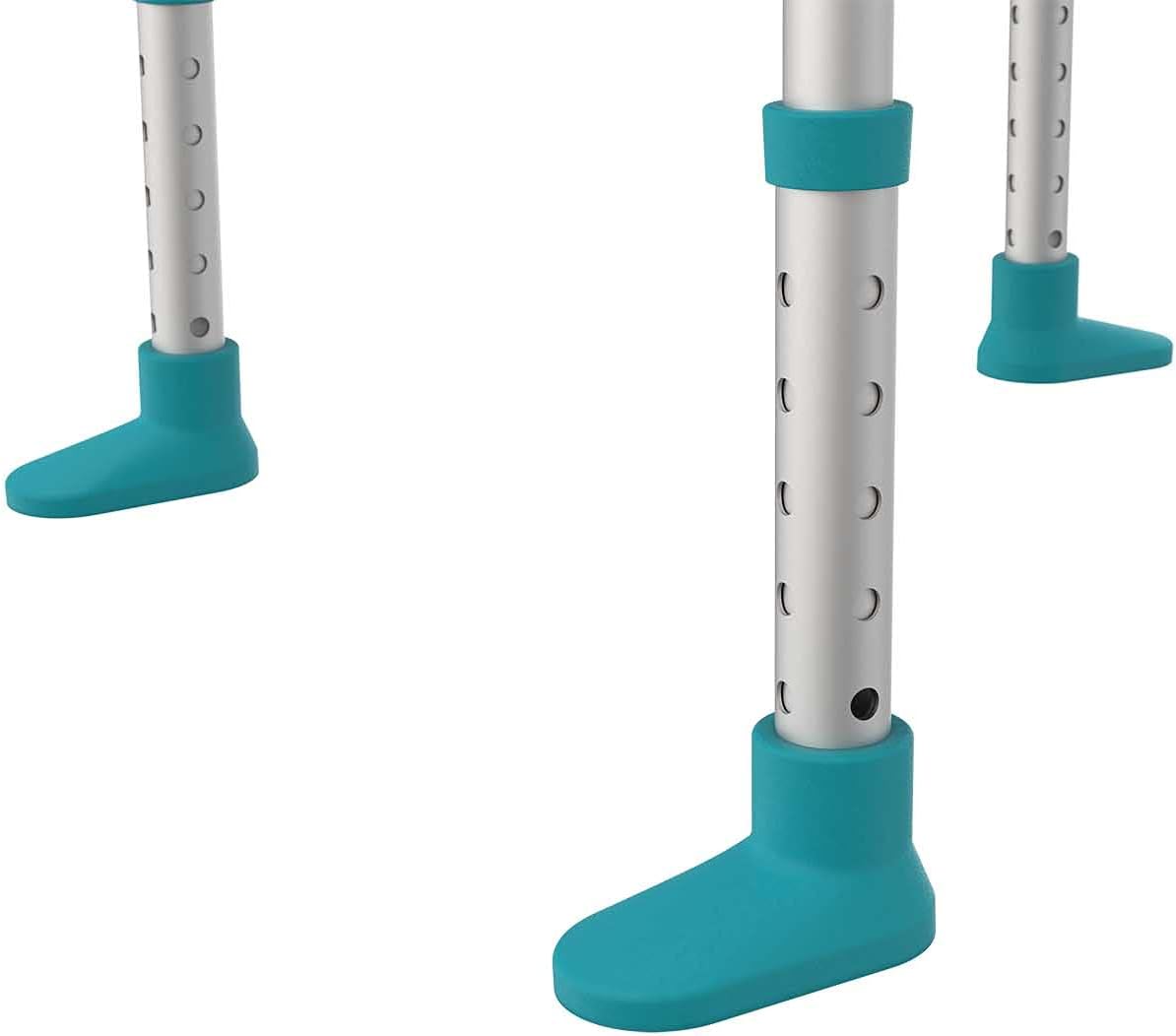 Teal leg guards with white polka dots on a white background